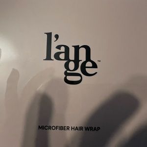 Brand new, never opened l’ange microfiber hair wrap.